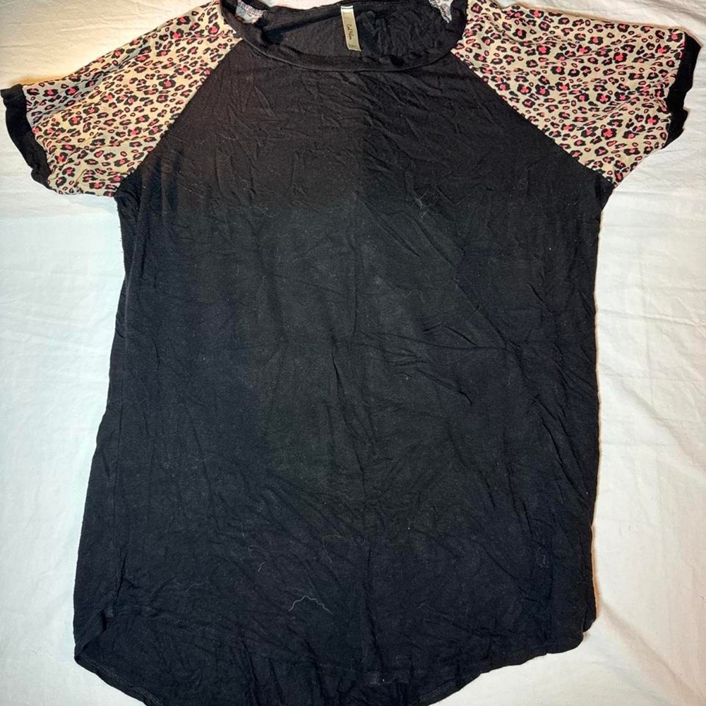 black & pink leopard print top with a unique design
